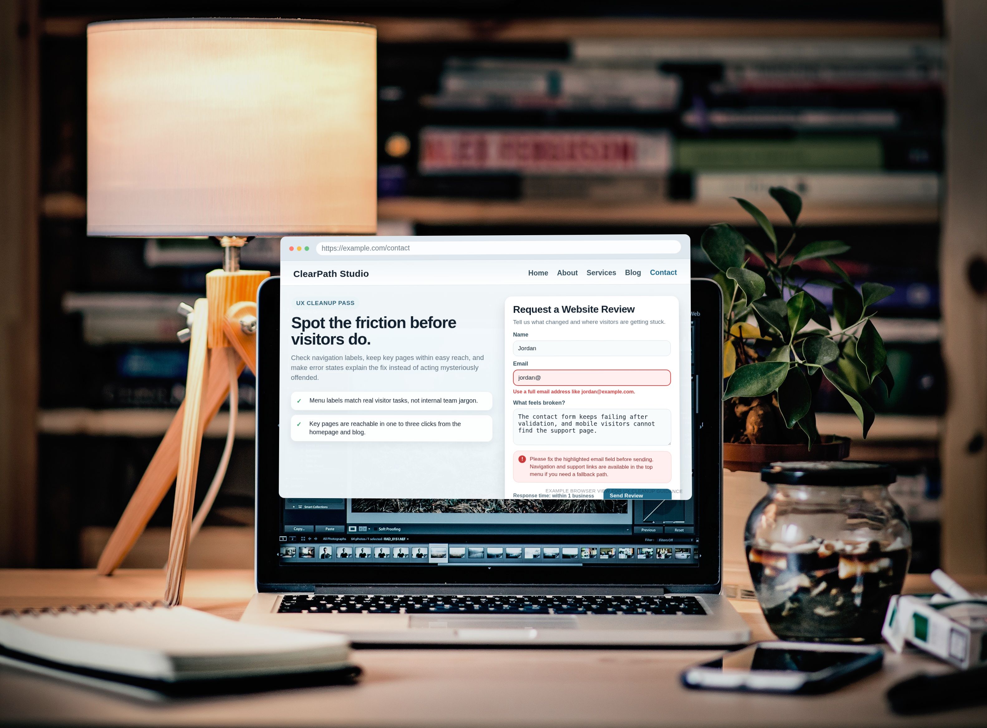 Laptop on a desk showing a browser with navigation links and a form validation error state.